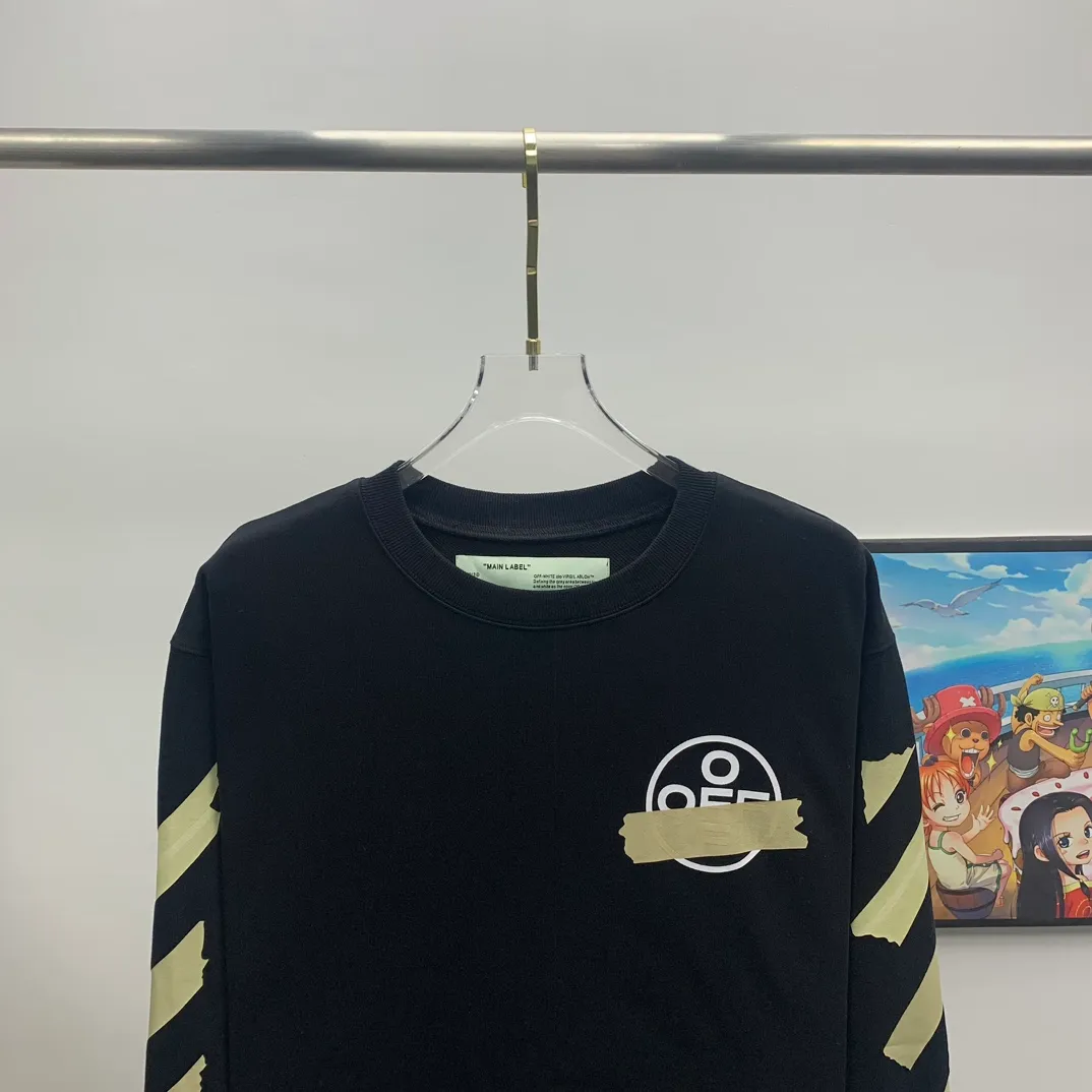Top tested version OFF WHITE OW hot stamping strip printing male and female couple pure cotton loose same style pullover hooded sweatshirt The printing is done on a Japanese-owned Mimaki printing machine, with no edges or burrs. Inkjet heat transfer is hot-pressed and cold-teared, and the high temperature is 180 degrees. The front piece needs to be pressed twice (the second time requires 180kg of air pressure). The transparent fabric is anti-scratch and ironing, and the printing is fog-free. The semi-transparent tape in the front circle can reveal the part of the printing underneath. The golden printing color of the tape is not The flat color and tape printing overlap have different color depths. The wash label is also customized according to the original font. The accessories still use the full line of correct accessories. The rectangular woven collar label design is cancelled. The previous three-dimensional silicone feel font is changed to a fully woven collar label. Fluorescent fonts can be seen on the collar label. The five-link silicone hangtag, three-link washable label and zebra crossing packaging line are still the same. 480g pure cotton terry fabric, a major launch with full drape. A full set of customized accessories, one-to-one mold opening, professional ow. Size: XS-L Size chart